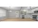 Open-concept kitchen with new appliances, ample counter space, and natural light, creating a perfect space for cooking at 2917 Reveille Se Cir, Atlanta, GA 30316