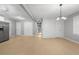 Spacious living area with modern lighting, sleek flooring, and ample natural light, perfect for entertaining at 2917 Reveille Se Cir, Atlanta, GA 30316