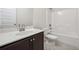 Clean bathroom with vanity, sink, toilet, and shower/tub combination at 3373 Shoals Ridge Dr, Dacula, GA 30019