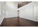 Spacious living room featuring soaring ceilings, hardwood floors, and ample natural light from large windows at 3373 Shoals Ridge Dr, Dacula, GA 30019
