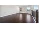 Open loft area with hardwood floors, natural light, and view of the surroundings at 3373 Shoals Ridge Dr, Dacula, GA 30019