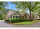 Charming single-story home featuring brick accents, manicured landscaping, and a welcoming entrance at 3746 Vineyards Lake Nw Cir # U6, Kennesaw, GA 30144