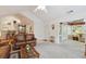 Comfortable living room showing an open floor plan view into the kitchen and sunroom at 3746 Vineyards Lake Nw Cir # U6, Kennesaw, GA 30144
