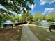 Scenic pond with fountains, benches, landscaping, and a path leading to the community at 3746 Vineyards Lake Nw Cir # U6, Kennesaw, GA 30144
