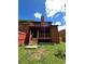 Exterior view of back porch with steps leading to a grassy backyard, chimney stack visible at 1001 Park Gate Pl, Stone Mountain, GA 30083