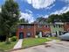 Charming multi-Gathering homes with well-kept lawns, blue shutters and dedicated parking at 1001 Park Gate Pl, Stone Mountain, GA 30083