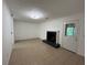 Spacious living room with tile floors, fireplace, and access to outdoor area through a glass-paneled door at 1001 Park Gate Pl, Stone Mountain, GA 30083