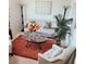 Living room with stylish furniture, area rug, and decorative accents at 110 Halibut Cir, Covington, GA 30016