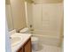 Neat bathroom equipped with a shower-tub combination and a single sink vanity at 1177 Arlington Sw Ave, Atlanta, GA 30310