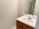 Cozy bathroom featuring a single sink vanity and a large mirror at 1177 Arlington Sw Ave, Atlanta, GA 30310