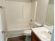 Functional bathroom with a shower-tub combination and a single sink vanity at 1177 Arlington Sw Ave, Atlanta, GA 30310