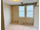 Bedroom with potential for renovation, showing bare floors and lots of natural light at 1177 Arlington Sw Ave, Atlanta, GA 30310