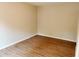 Neutral bedroom showcasing lovely wood-look floors and light-filled open space at 1177 Arlington Sw Ave, Atlanta, GA 30310