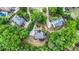 Aerial view of a residential neighborhood surrounded by lush greenery at 1235 Legend Run, Alpharetta, GA 30005