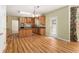 Well-lit kitchen featuring wood cabinets, granite countertops, and stainless steel appliances at 1235 Legend Run, Alpharetta, GA 30005