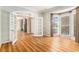 Bright room with hardwood floors, bay windows and french doors at 1235 Legend Run, Alpharetta, GA 30005