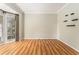 Cozy room with natural light, hardwood floors and minimalist decor at 1235 Legend Run, Alpharetta, GA 30005