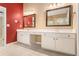 Main bathroom featuring a double vanity with framed mirrors and white cabinets at 1235 Legend Run, Alpharetta, GA 30005