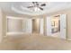 Large main bedroom with multiple doorways leading to other rooms and ample open space at 1235 Legend Run, Alpharetta, GA 30005