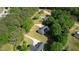 Aerial view of lovely home nestled among lush greenery offers a tranquil and private setting at 65 Ashland Farm Rd, Oxford, GA 30054