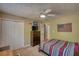 Bedroom featuring a full closet, soft carpeting and a comfy bed at 65 Ashland Farm Rd, Oxford, GA 30054