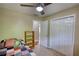 Spare bedroom features closet and ceiling fan at 65 Ashland Farm Rd, Oxford, GA 30054