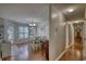 Bright dining area with a table, chairs, and a door leading to the outside at 65 Ashland Farm Rd, Oxford, GA 30054