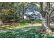 Beautiful landscaped yard and exterior with a small house at 66 Devon Ln, Avondale Estates, GA 30002