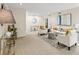 Spacious living room featuring neutral tones, stylish decor, and ample natural light at 66 Devon Ln, Avondale Estates, GA 30002