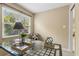 Light filled office with large window, natural light, neutral colors, and modern desk at 66 Devon Ln, Avondale Estates, GA 30002