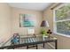 Inviting office with natural light, neutral colors, and modern desk at 66 Devon Ln, Avondale Estates, GA 30002