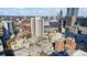 A full aerial view of the city showing the buildings, The Legacy, and the fair on a bright sunny day at 90 Fairlie Street Nw #801 # 801, Atlanta, GA 30303
