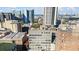 The aerial view of the apartment shows views of the cityscape at 90 Fairlie Street Nw #801 # 801, Atlanta, GA 30303