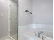 Bright bathroom featuring soaking tub and glass enclosed shower at 90 Fairlie Street Nw #801 # 801, Atlanta, GA 30303
