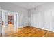 Bedroom featuring hardwood floors, closet and pass-through to kitchen at 90 Fairlie Street Nw #801 # 801, Atlanta, GA 30303