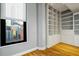 Bedroom with a large window offering city views and built in shelving at 90 Fairlie Street Nw #801 # 801, Atlanta, GA 30303