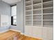 Bedroom featuring a large window and built in shelving at 90 Fairlie Street Nw #801 # 801, Atlanta, GA 30303