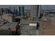 Classic building featuring lots of windows with the city skyline and fair in the background on a bright sunny day at 90 Fairlie Street Nw #801 # 801, Atlanta, GA 30303