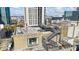 Building with an outdoor space featuring black metal stairs, seating area, and an incredible view of the city at 90 Fairlie Street Nw #801 # 801, Atlanta, GA 30303