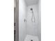 White tiled shower with shower head at 90 Fairlie Street Nw #801 # 801, Atlanta, GA 30303