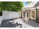 Backyard deck with privacy fence and string lights, providing a perfect outdoor living space at 1077 Shady Valley Ne Pl, Atlanta, GA 30324