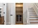 Hallway featuring a convenient beverage center with a wine cooler and shelving at 1077 Shady Valley Ne Pl, Atlanta, GA 30324