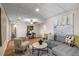 Cozy living room with comfortable seating, a decorative rug, and ample lighting for relaxation and entertainment at 1077 Shady Valley Ne Pl, Atlanta, GA 30324