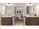 Bathroom featuring a double vanity with a view into the bedroom and outdoor space at 1077 Shady Valley Ne Pl, Atlanta, GA 30324