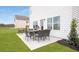Spacious patio with dining set, perfect for outdoor entertaining at 1315 Elowen Dr, Austell, GA 30168