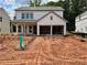 Charming two-story home with a two-car garage and covered porch, ready to be personalized at 2076 Boxwood Circle Se, Conyers, GA 30094