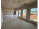 Bright living room featuring a door to outside and many windows, with a modern, open feel at 2076 Boxwood Circle Se, Conyers, GA 30094