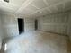 Spacious living room featuring smooth, freshly installed drywall and ample natural light potential at 2076 Boxwood Circle Se, Conyers, GA 30094