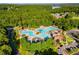 Aerial view showcasing a community pool and surrounding green space, illustrating the community's recreational opportunities at 679 Gold Valley Pass, Canton, GA 30114