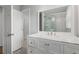 Bathroom vanity with marble countertop, framed mirror, and stylish fixtures at 679 Gold Valley Pass, Canton, GA 30114